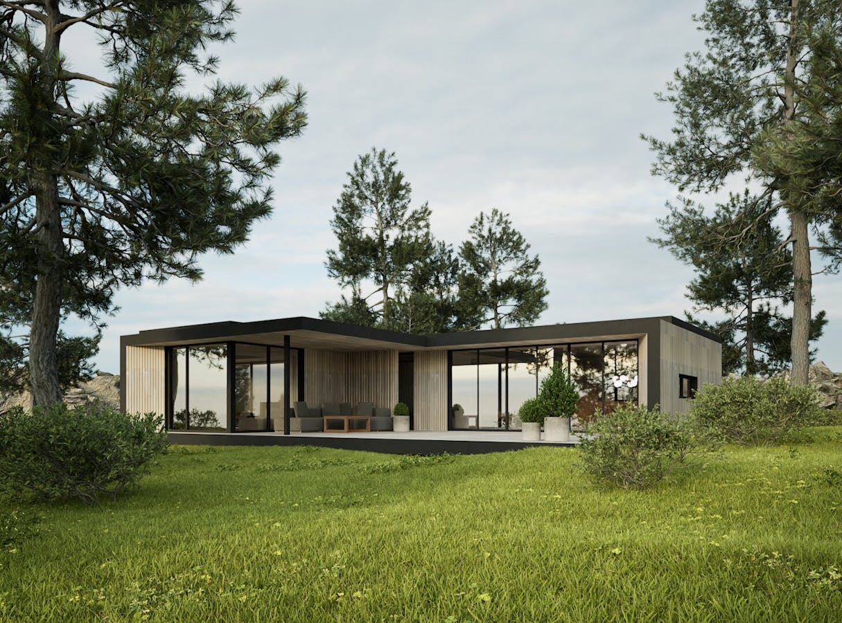 Den ultimate sommerhytta U‑3040 fasade med terrasse og store vinduer