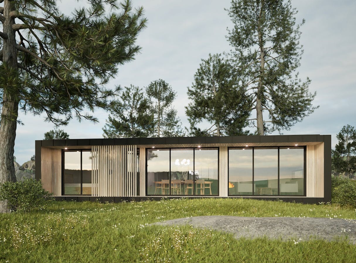 Unik funkishytte i ett med naturen – moderne fasade med store vinduer